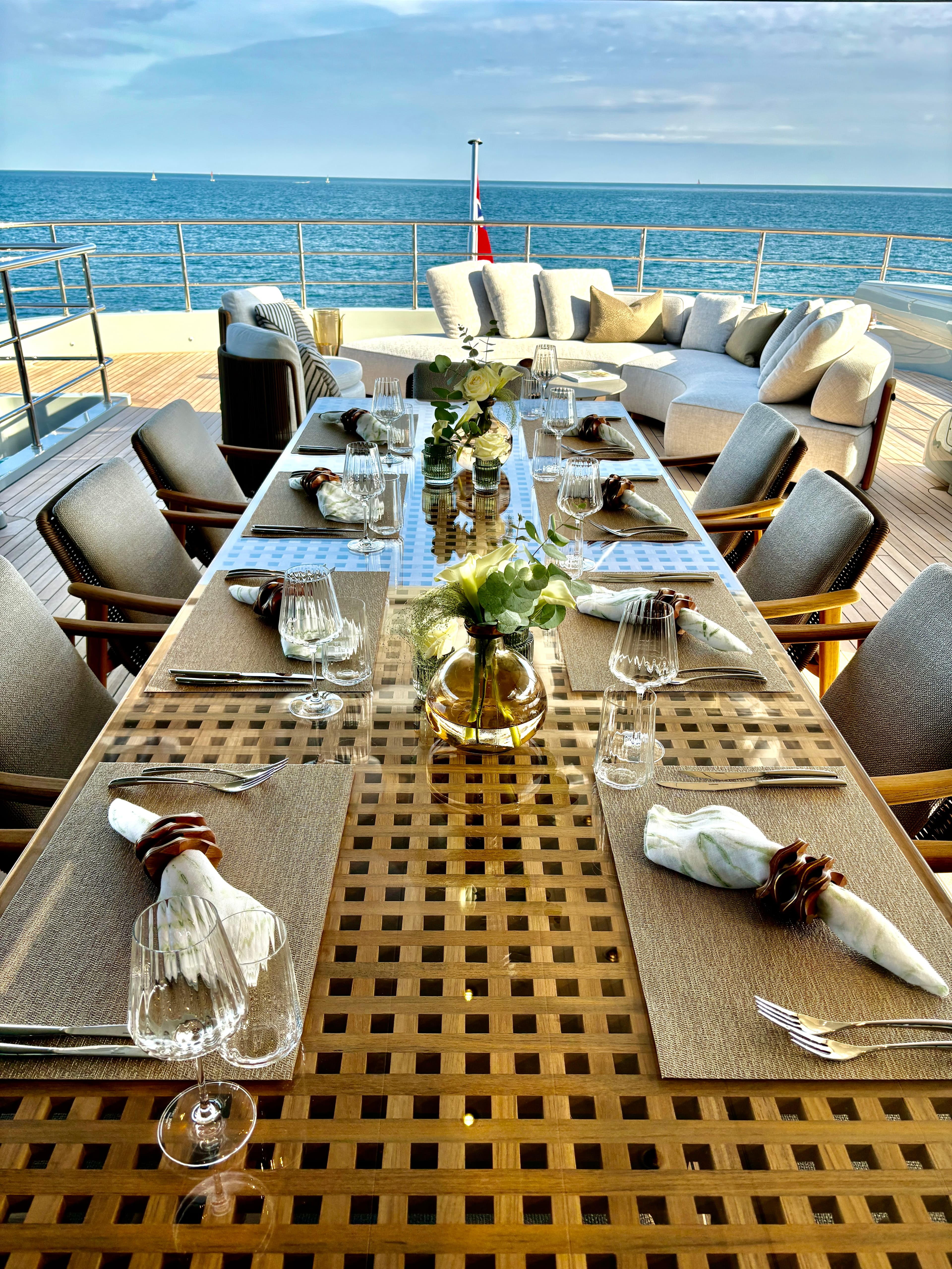 Luxury yacht interior design - elegant dining room with sophisticated lighting