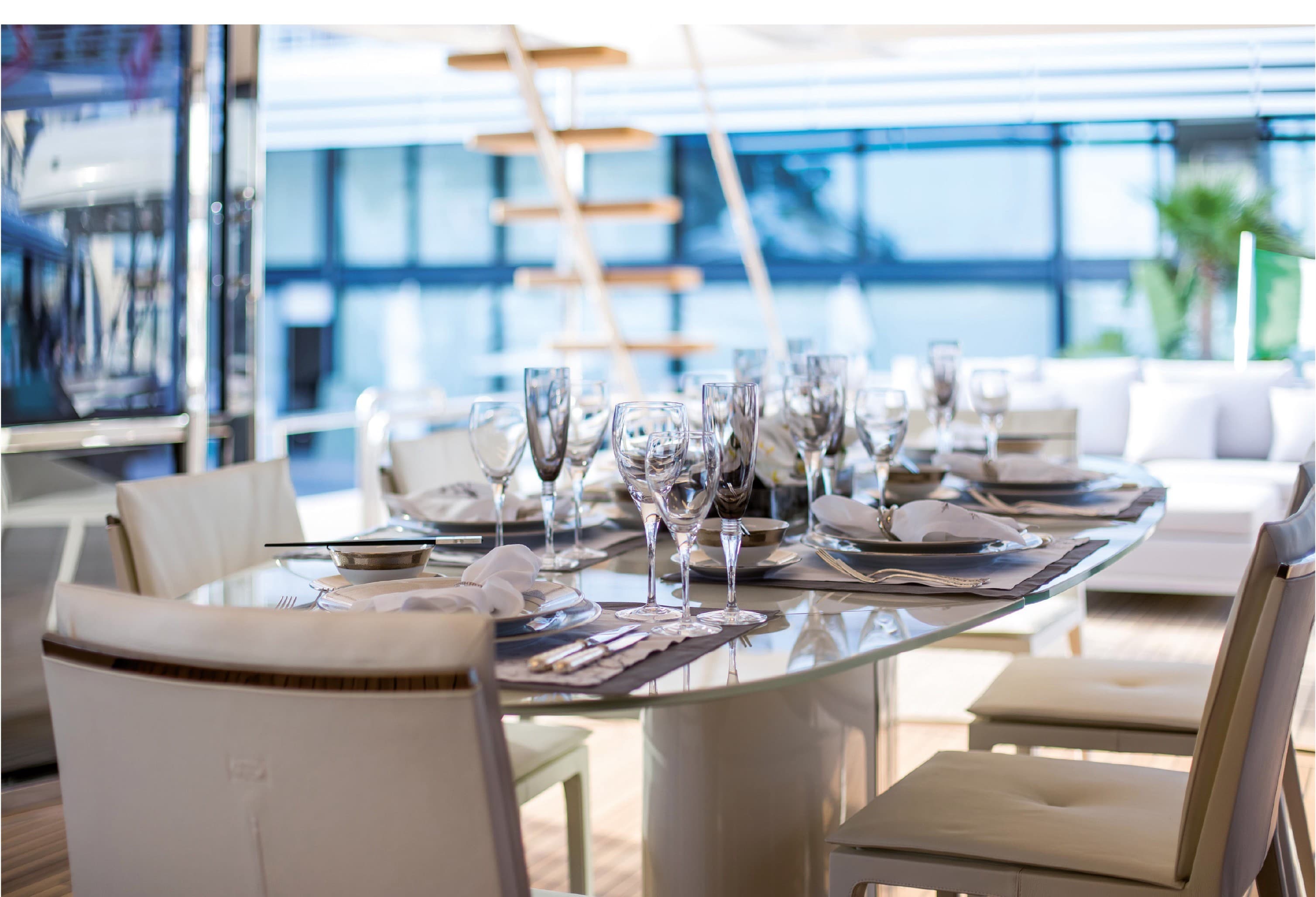 Luxury yacht interior design - elegant dining room with sophisticated lighting